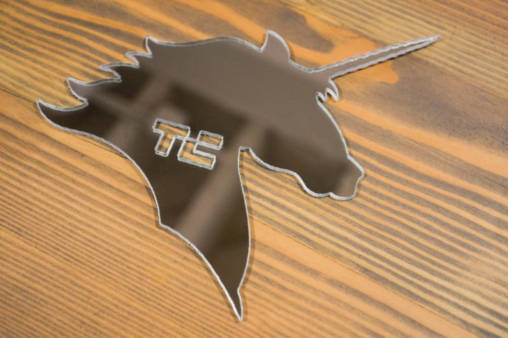 A mirror, cut into the shape of an unicorn. With a TechCrunch logo on it. There's a lot to like here.