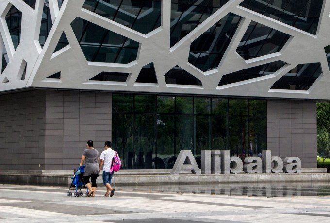 Logo and headquarter building of Alibaba Group in Hangzhou